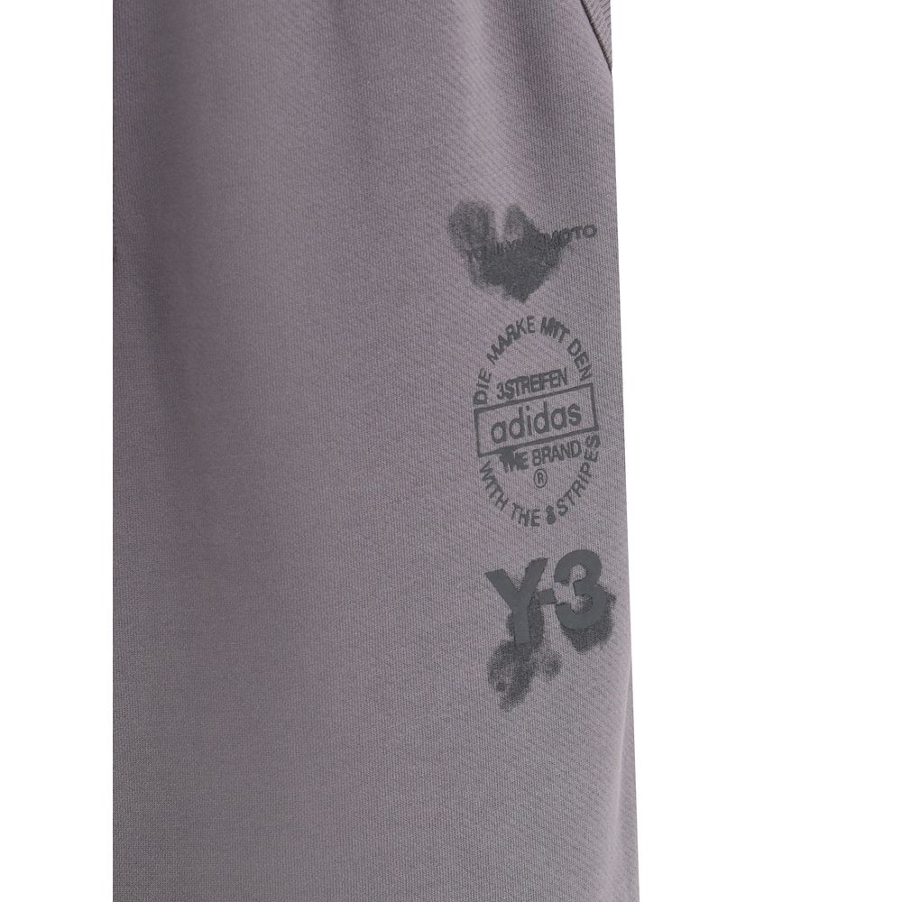 Close-up of the logo detail on Y-3 Gray Cotton Joggers (Workout Pants) showcasing Adidas branding and unique design.