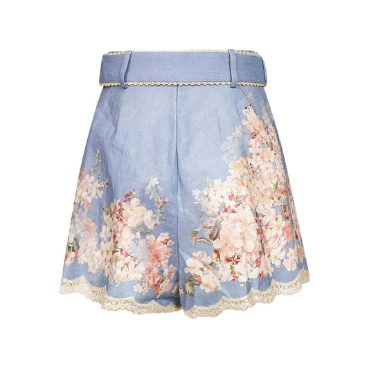 Zimmermann Floral-print belted shorts with blue botanical design, scalloped lace trim, and detachable belt.